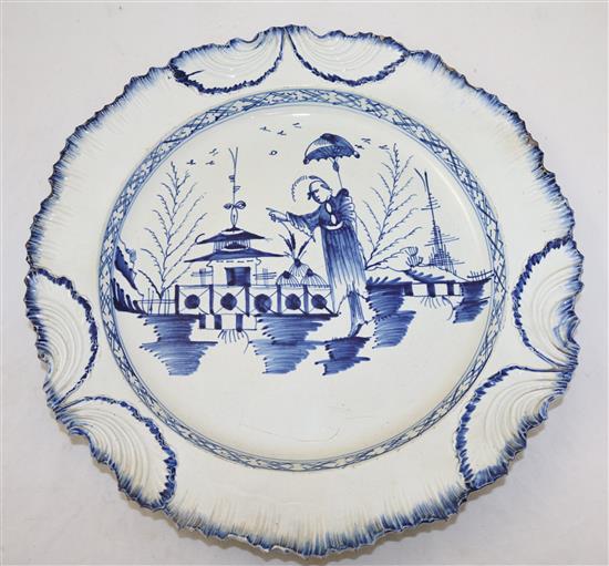 A pair of pearlware blue and white dishes and another similar pearlware dish, late 18th century, both diam. 35.5cm